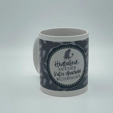 Spruchtasse "Hinfallen. Aufstehen. Katze streicheln. Weitermachen."